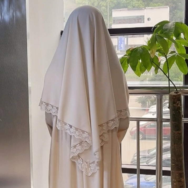 A lace lace hijab khimar for a Turkish Muslim woman during Ramadan in Dubai, Middle East MSL184