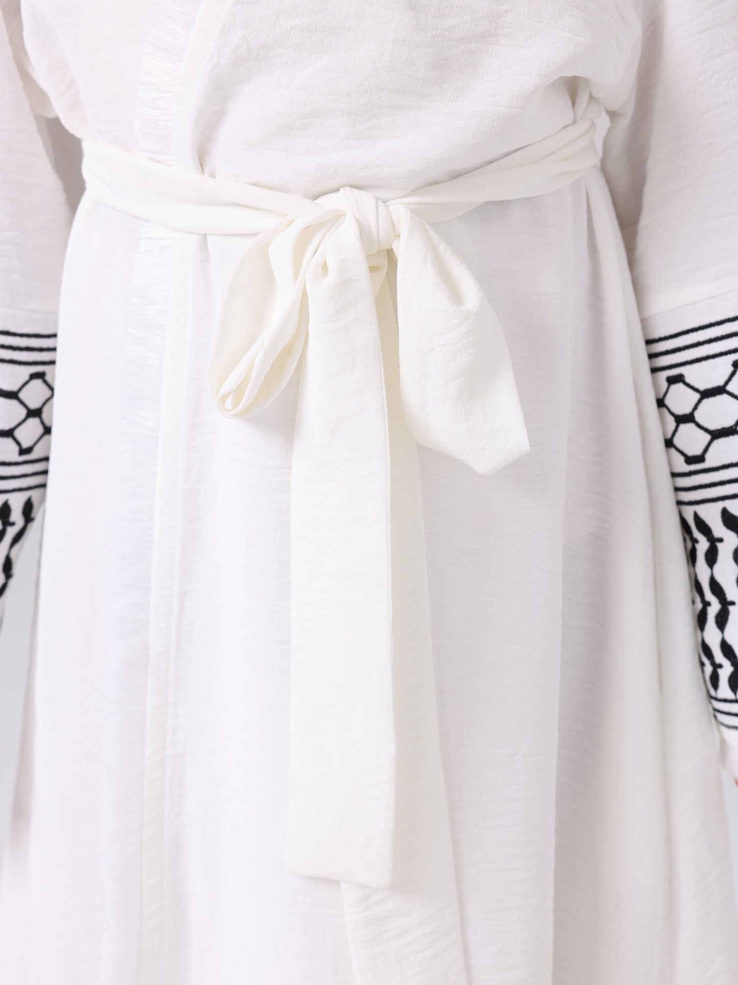 A Middle Eastern Muslim girl abaya embroidered fringed coat with a belt MSL202